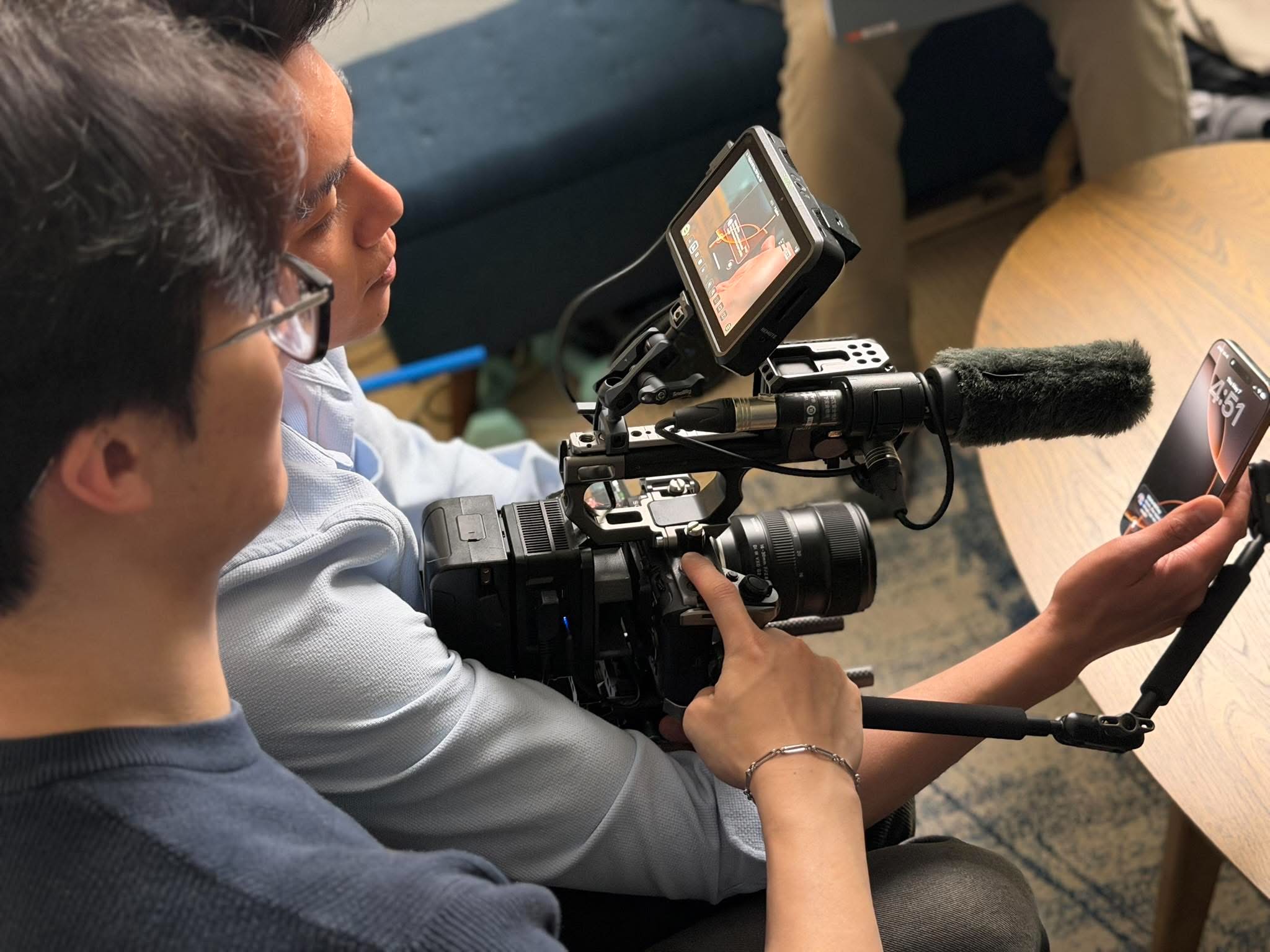Camera rig with shotgun microphone and phone rig on a shoot day